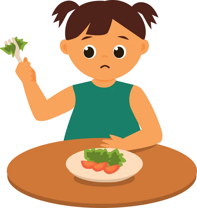 A child looking unhappily at a plate of vegetables